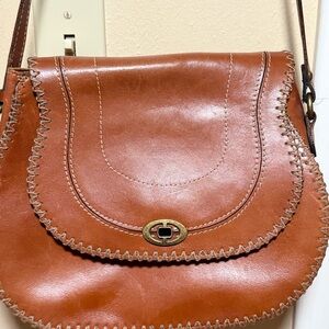 Patricia Nash Brown Leather Crossbody Bag with Saddle Shape and Turnlock Closure